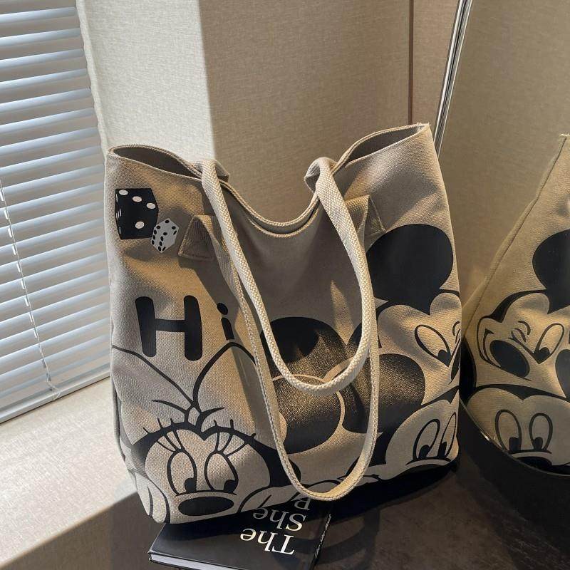 新品日系卡通帆布包包女2025新款大容量学生上课手提袋通勤单肩托