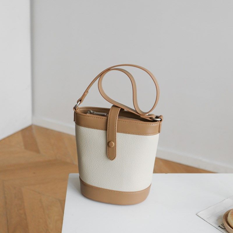 包包女2024新款休闲拼色水桶y包斜挎单肩手提通勤上班小拎包高级,箱包皮具/热销女包/男包,水桶包,淘宝优惠券,粉丝福利购,淘宝优惠卷