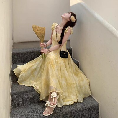 长款黄色海边度假风连衣裙长裙2025新款显瘦裙子女夏飞飞袖