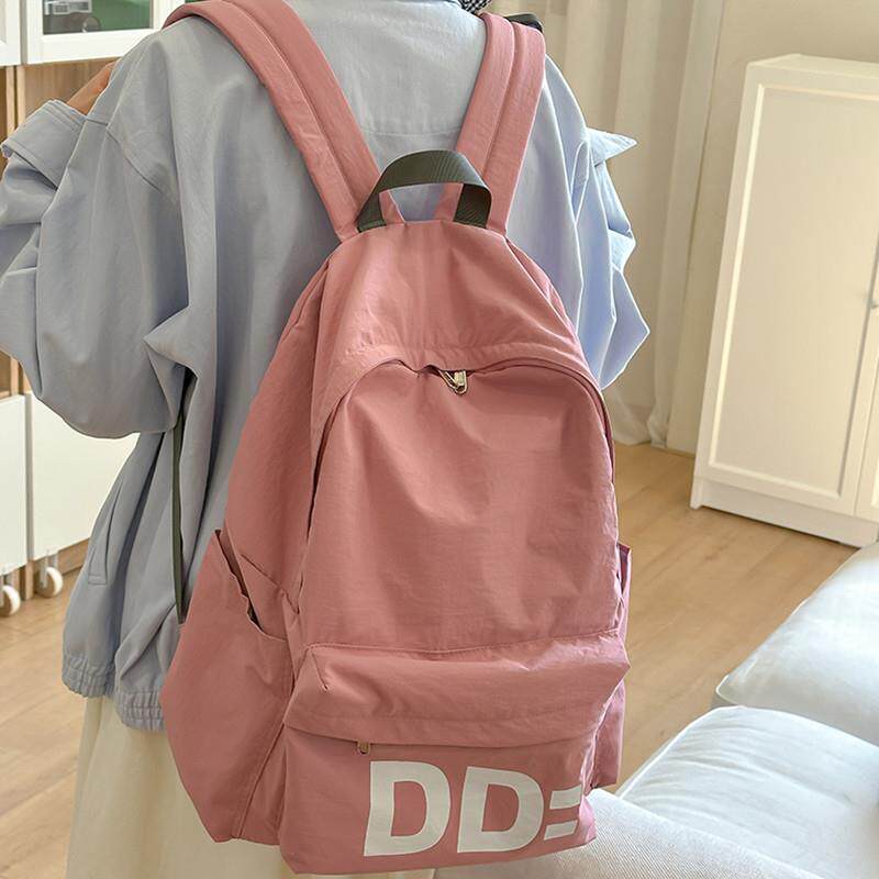 新品小学生书包女初中生简约轻便背包大学生2025女款百搭双肩包通