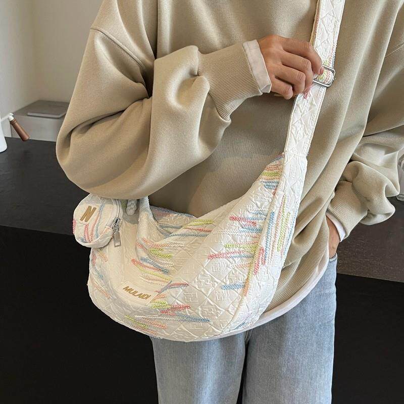 新品休闲大容量帆布包女夏季新款时尚轻便单肩包学生党通勤斜挎饺