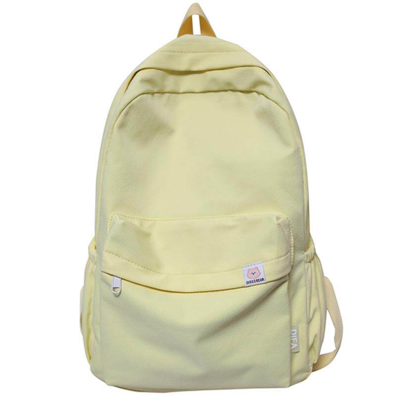 新品奶黄色书包女生初中生大容量双肩包日系简约纯色大学生学院风