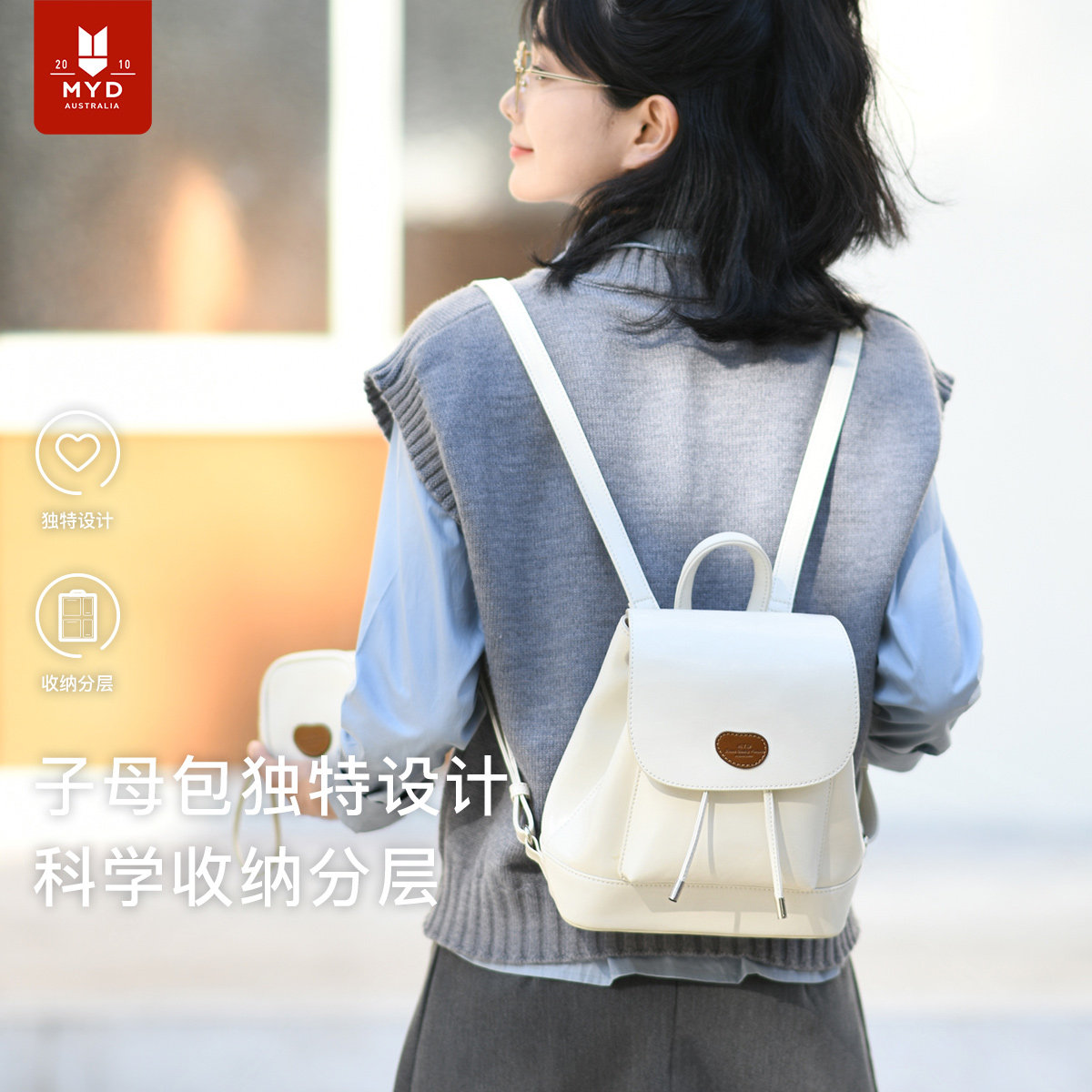 银色双肩包女皮质新款时s尚设计感小众抽绳背包女士双肩小型迷你