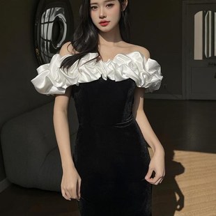 一字肩黑色晚礼服2024新款名媛气质高端鱼尾连衣裙迎宾主持人年会