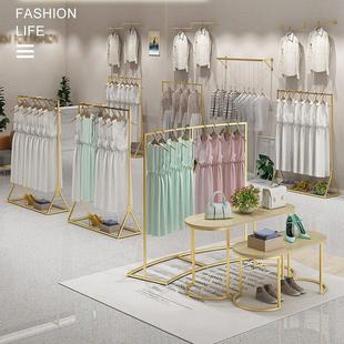 金色女装店婚纱货架服装店展示架落地式挂衣架店铺装修设计效果图
