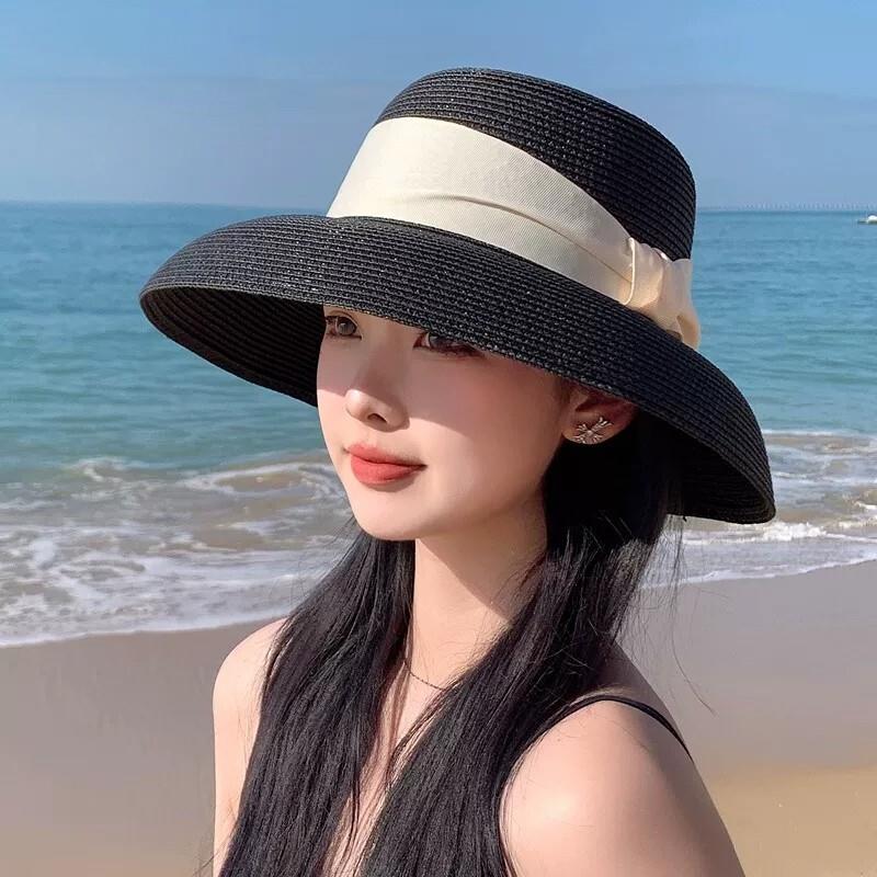 德国草编草帽女夏季大帽簷防晒遮阳帽海边沙滩礼帽蝴蝶结出游渔夫