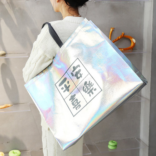 肩背炫彩镭射服装店无纺布手提袋