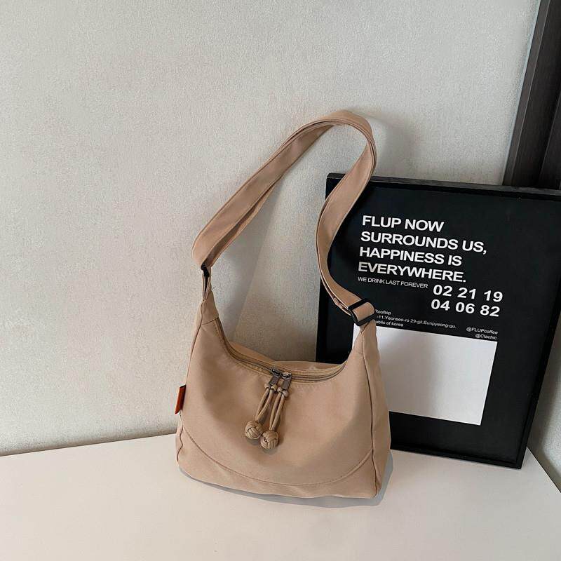 推荐时尚通勤单肩包包女2025新款春夏休闲百搭饺子包韩版大容量腋