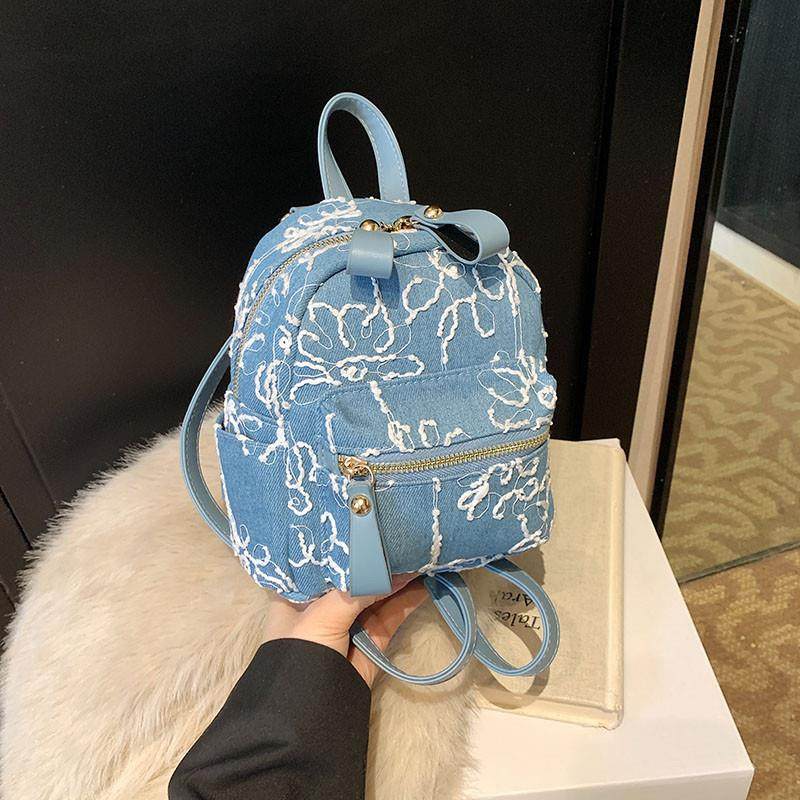 推荐蕾丝刺绣牛仔双肩包2025新款浅蓝色可爱休闲甜美小背包淑女包