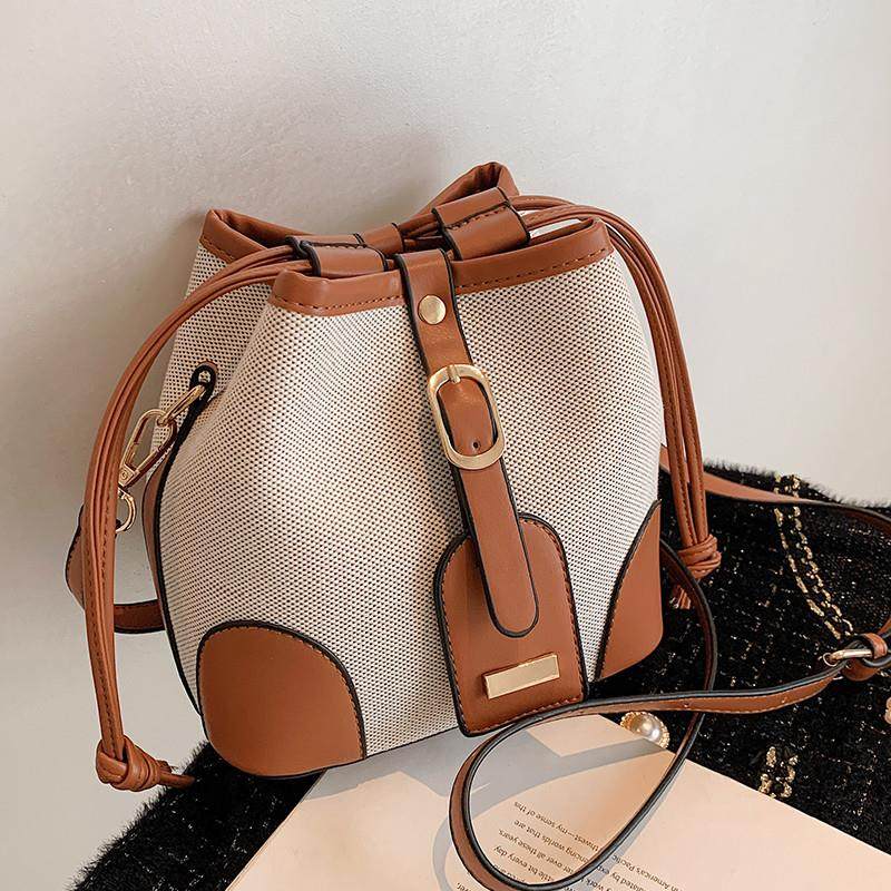 推荐高级感帆布撞色斜挎水桶包包女春夏2025新款潮小众设计百搭单