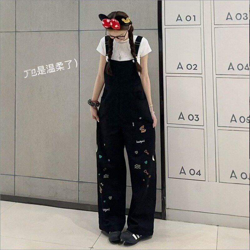 黑色重工童趣刺绣牛仔背带裤女春夏季新款宽松R显瘦W连体直筒阔腿