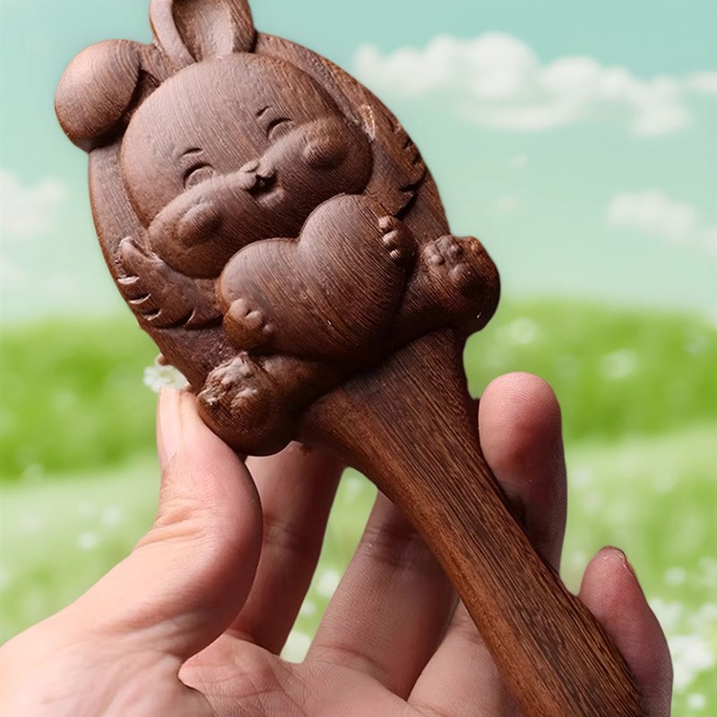 黑金檀木气垫梳雕刻卡通动v物气垫顺发梳头部经络按摩梳子周岁梳