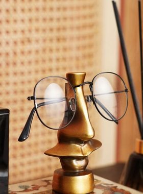 现代创意铜色树脂鼻子造型眼镜架托卧室书桌时尚个性眼镜支架摆件