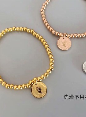 【钛钢不掉色】中国风金币钱币女王人头J像幸运招财弹力珠手链女
