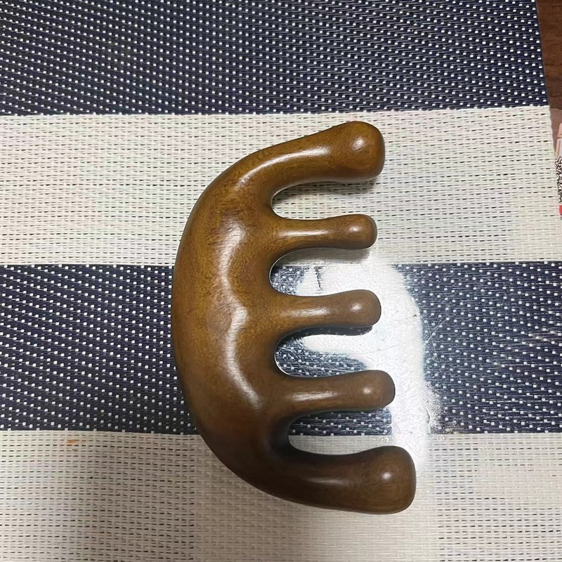 玩意儿就是长头发的东西!按摩头皮梳子天然檀木梳刮痧经络