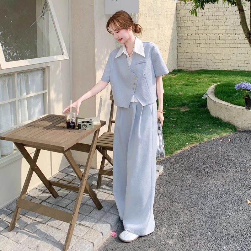 蓝色高级感假两件西装套装女2026夏季新款气质大方得体穿搭两件套