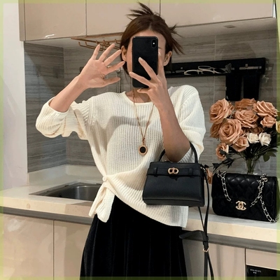 韩系设计感下摆提扣针织衫女