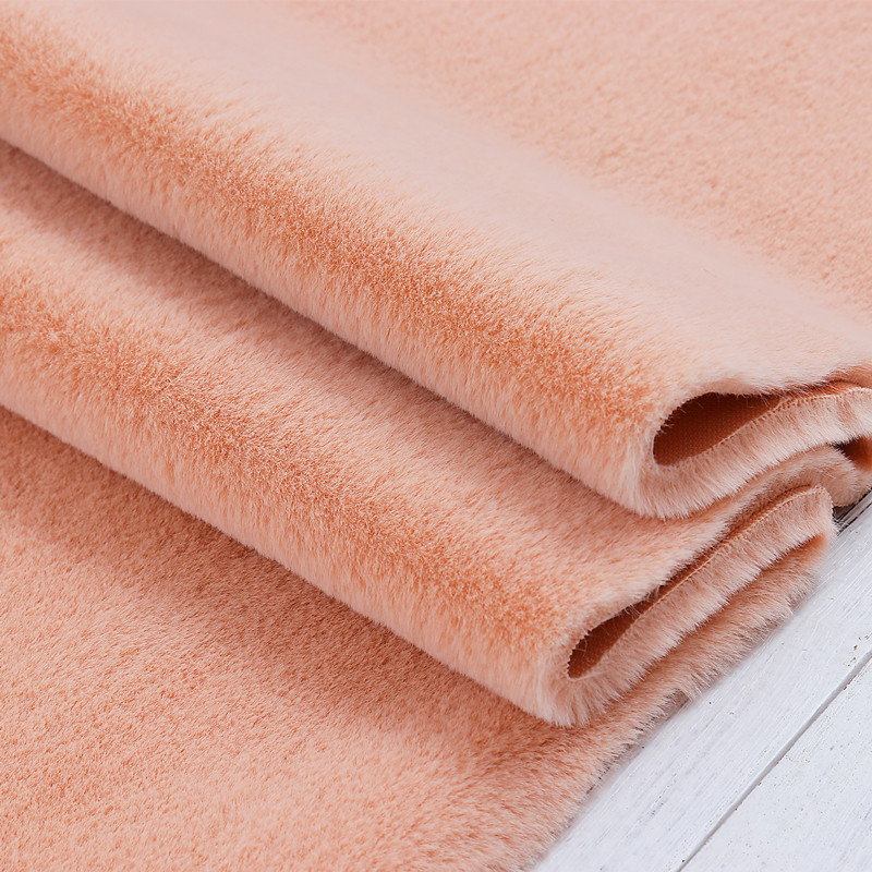 2019新款仿獭兔毛皮草毛绒布料白色柜台展示背景布服装抱枕桌布沙