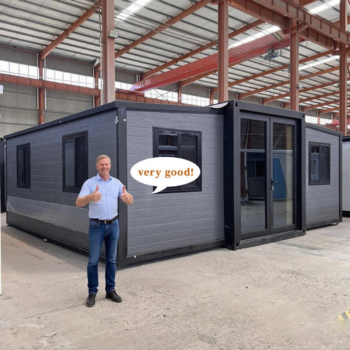 Mobile and foldable double-wing expansion container house