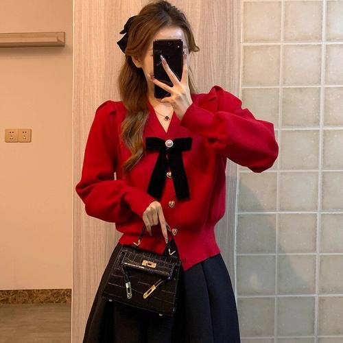 新年红色蝴蝶结毛衣女V领