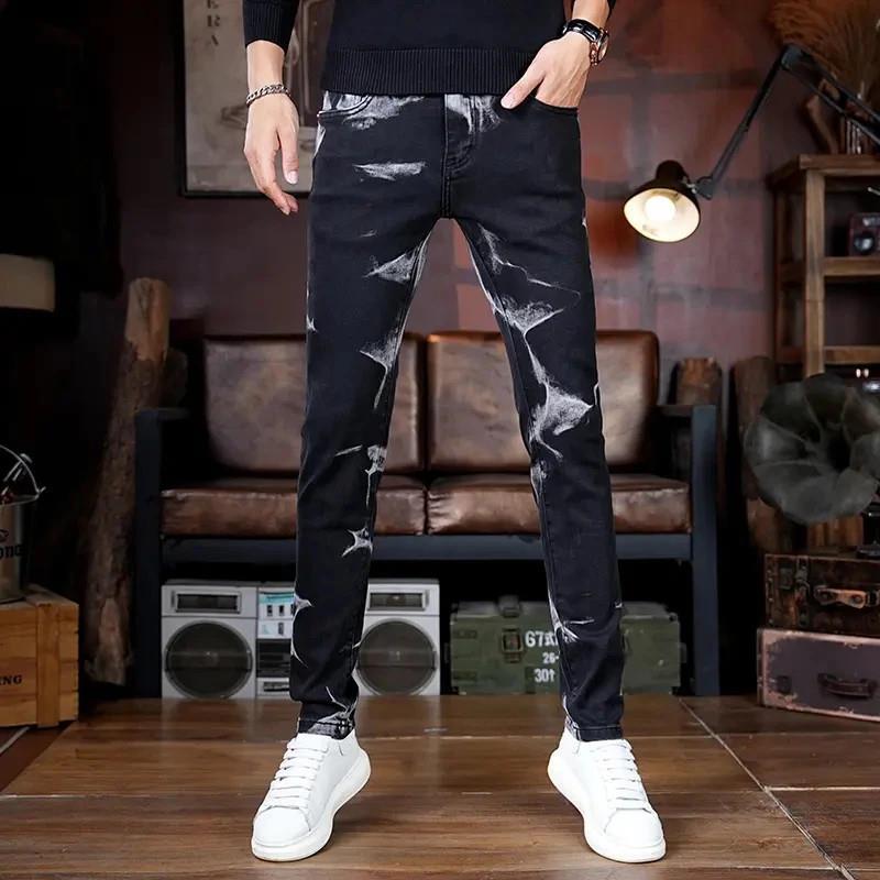 欧玖帅男装水墨印l花牛仔裤2025新款秋冬小脚修身弹力f潮流百搭长