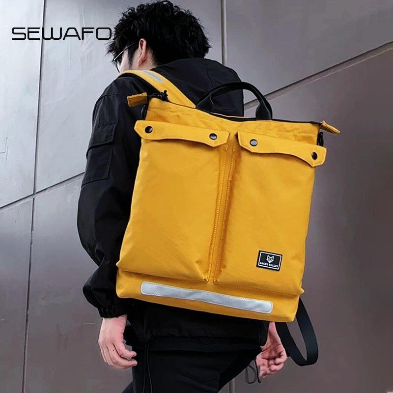 小众通勤手提斜挎双肩包男款轻便旅行背包男士大容量学生电脑书包