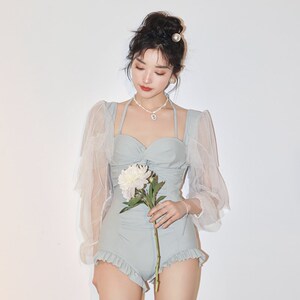 金珠泳衣女夏季纯欲风温泉u连体平角保守显瘦遮肚高级感长袖游泳