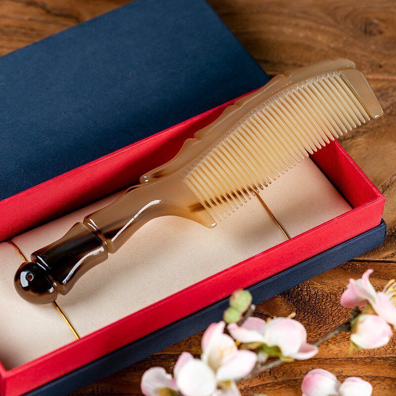 厂家纯天然牦牛角梳长发按摩竹节孔手柄防静电梳子创意包装女