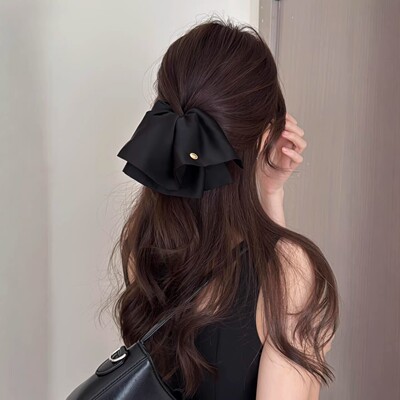 黑色裙摆法式缎面气质蝴蝶结抓夹