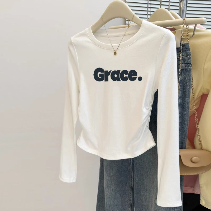 正肩纯棉长袖t恤女春秋季新款修身显瘦白色打底衫不规则短款上衣