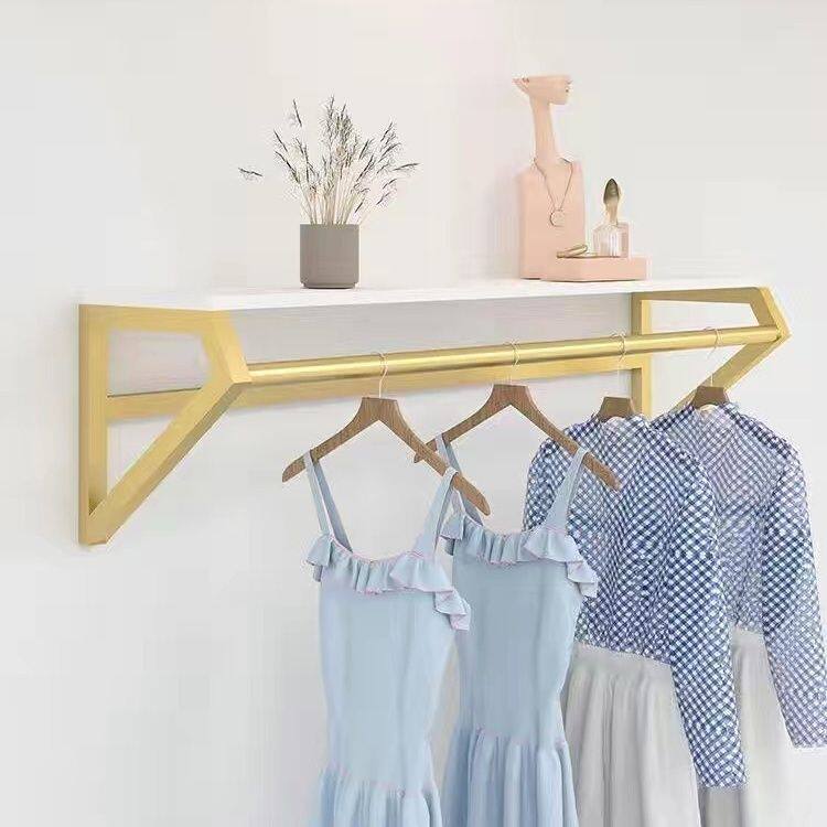 服装店展示架上墙上挂衣服架壁挂式金色女装店墙面挂衣杆专用童装