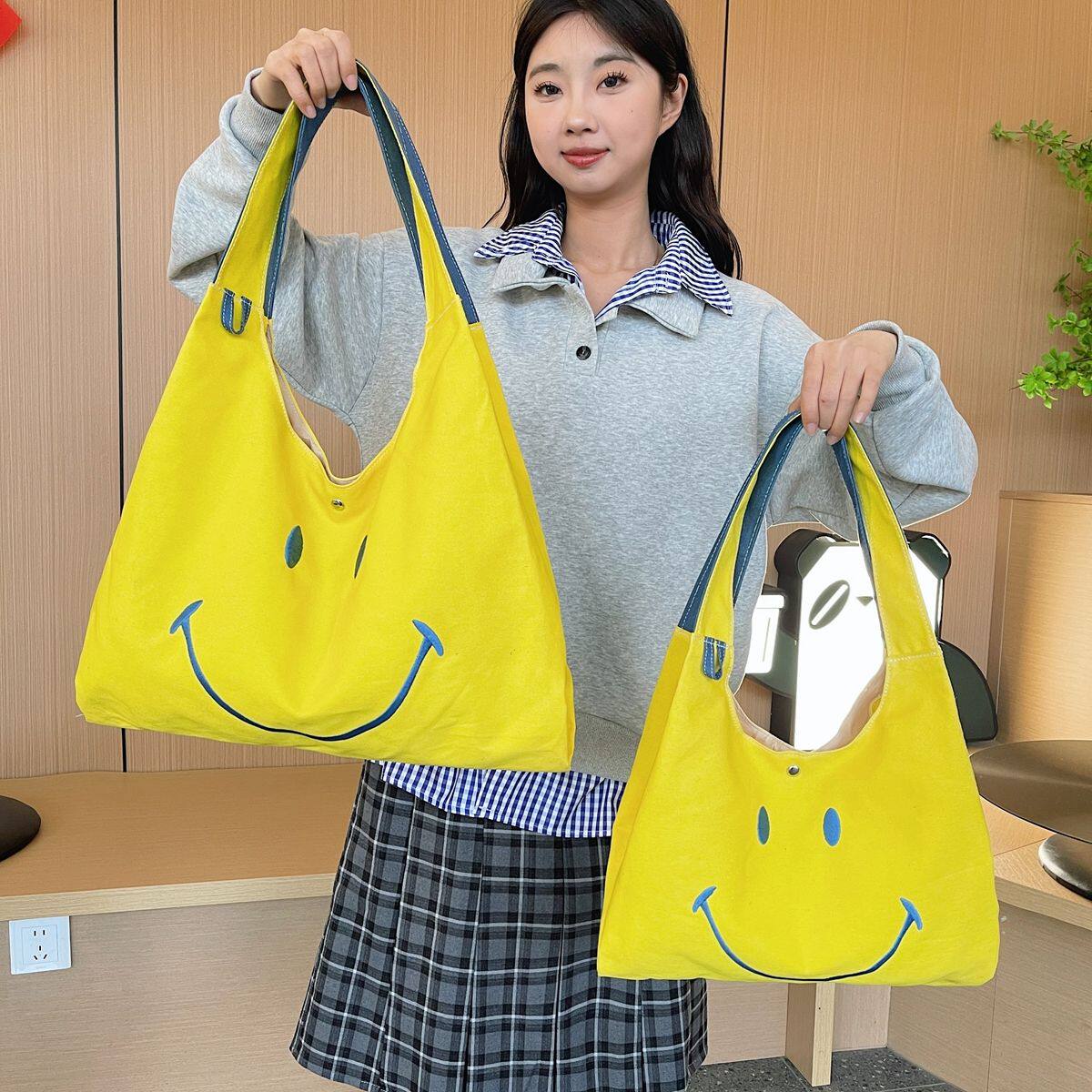 帆布包休闲大容量可爱2025新款笑脸单肩通勤手提托特少女轻便大包