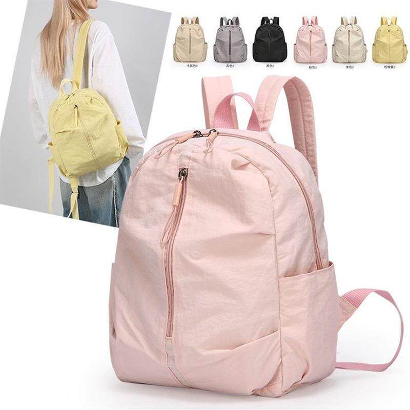 新款时尚轻便简约双肩包休闲女生大学生背包旅行旅游大容量书包