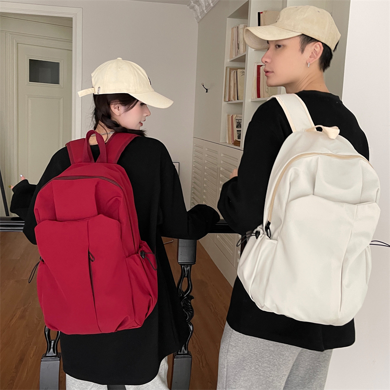 双肩包背包男士2023新款高级感电脑旅行通勤小众女大学生简约书包