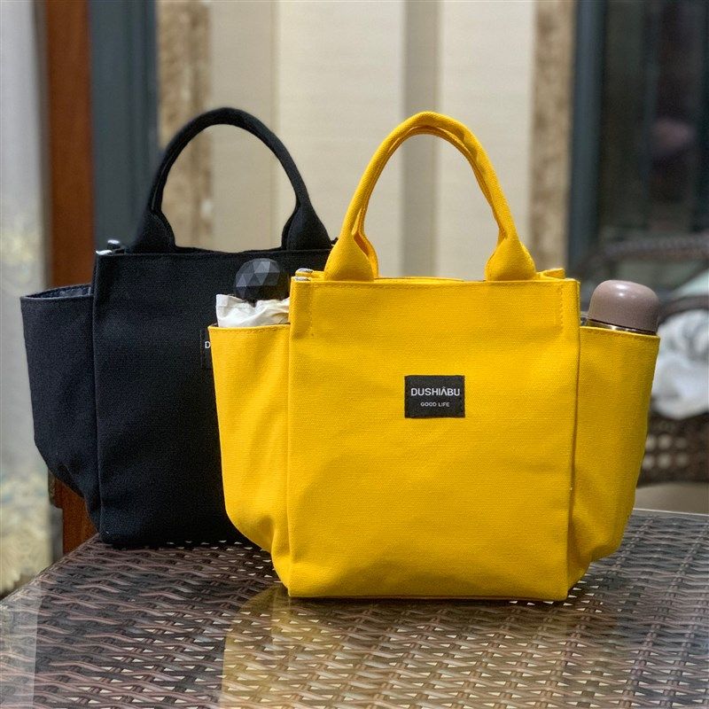 经典款式帆布带水杯位多口袋手提饭盒包妈咪包上班手拎便当包