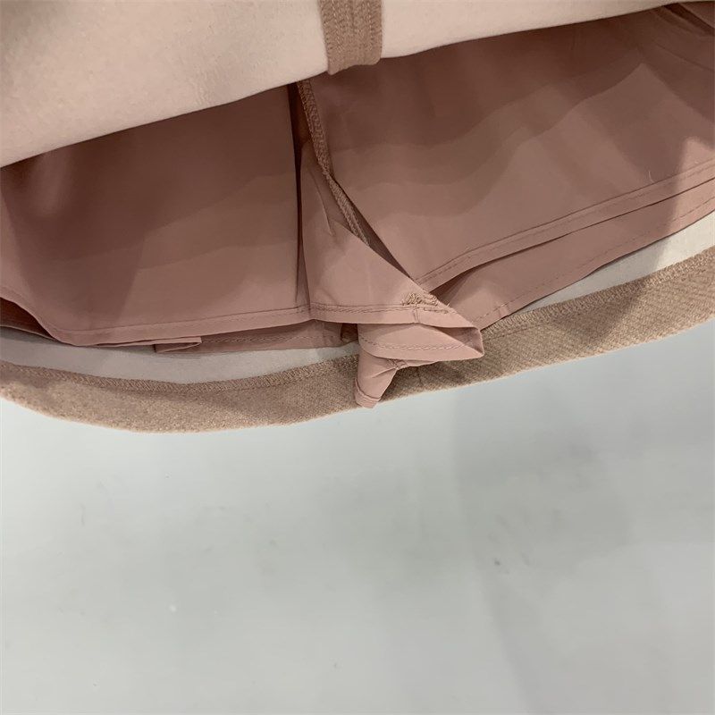 粉色毛呢半身裙女2025春季新款黑色高腰显瘦防走光a字包臀短裙子