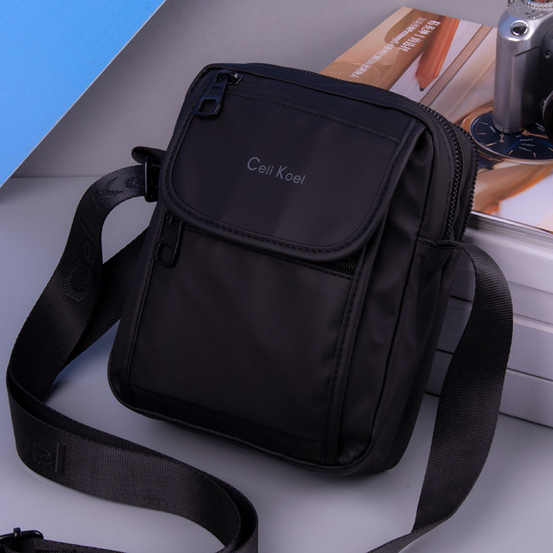 2024新款斜挎包男手机包中老年小背包男士休闲通勤牛津布男包迷你