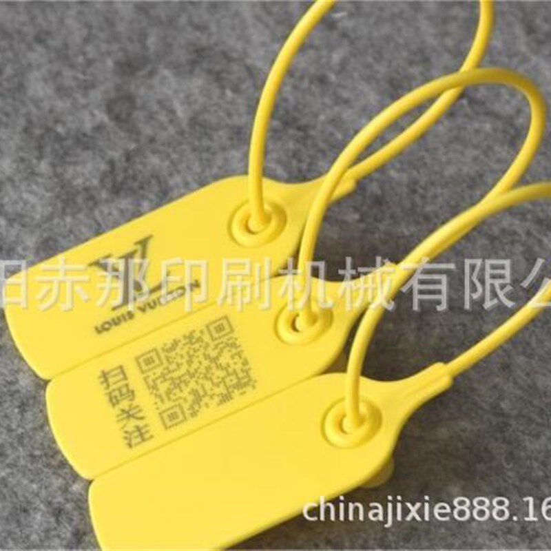 辽宁全新吊牌烫金机 沈阳服装牛仔裤皮牌烫金设备 皮革商标烙印机