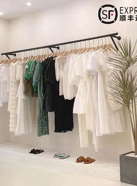 新款服装店上墙展示架黑色烤漆铁艺婚纱J童装女装店货架陈列挂衣
