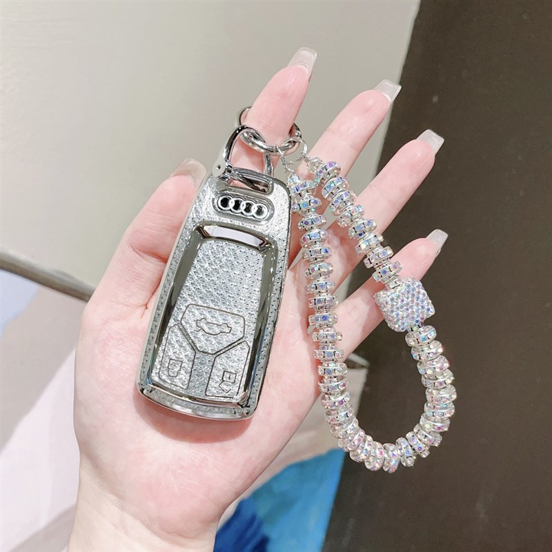 适用奥迪a4l车钥匙套新A6L/A3/A5/A7壳扣Q3/Q5折叠Q2车钥匙套女包