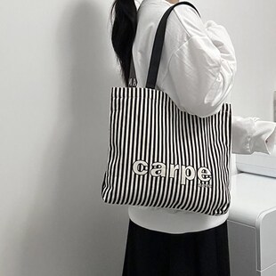 新款帆布包条纹男女学生书包通勤产检轻便大Q容量时尚百搭带拉链