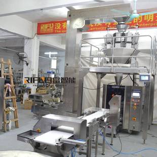 膨化食品花生颗粒包装 机 机坚果麦片袋装 机电子秤颗粒包装