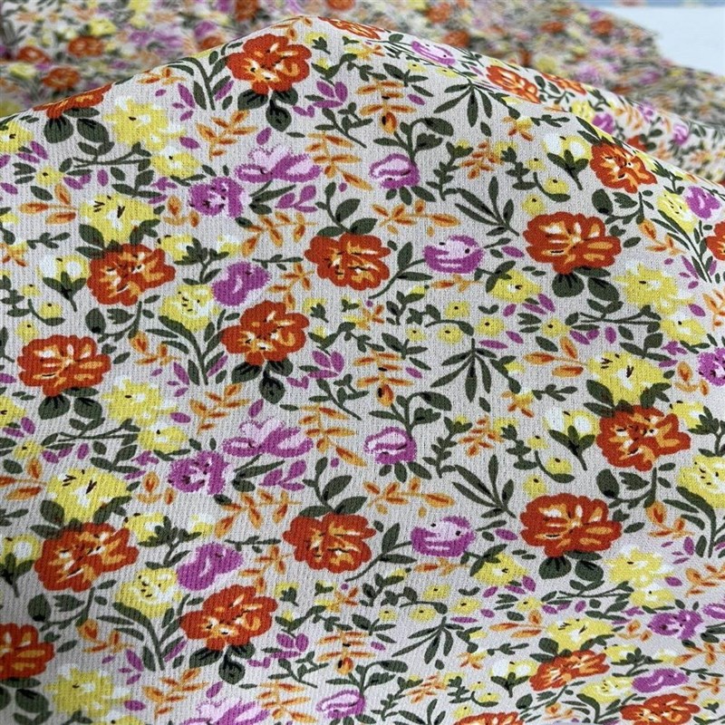 D412米色底小碎花印花雪纺布头 柔软透气垂坠连衣裙上衣旗袍面料