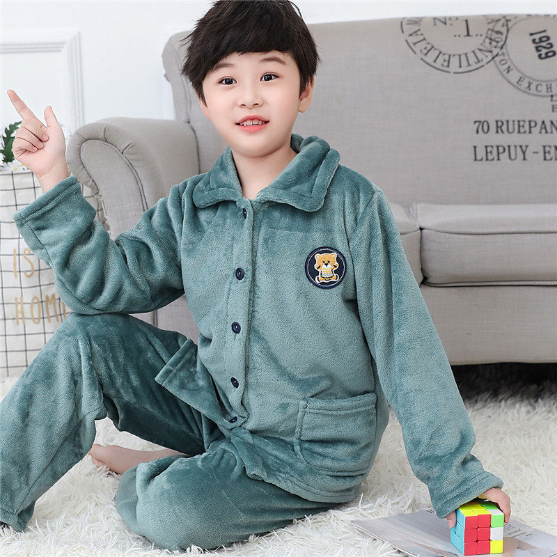 秋冬新款儿童法兰绒睡衣男孩女孩中大童珊瑚绒女童套装宝宝家居服