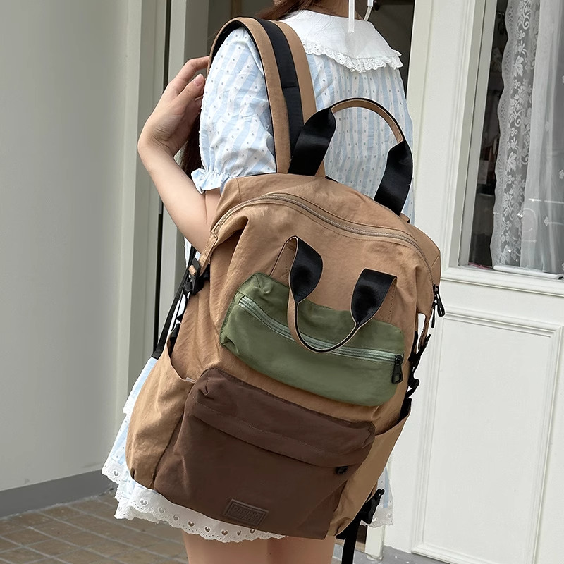 原创书包初中女生轻便手提双肩包中学生大学生通勤登山旅行背包女