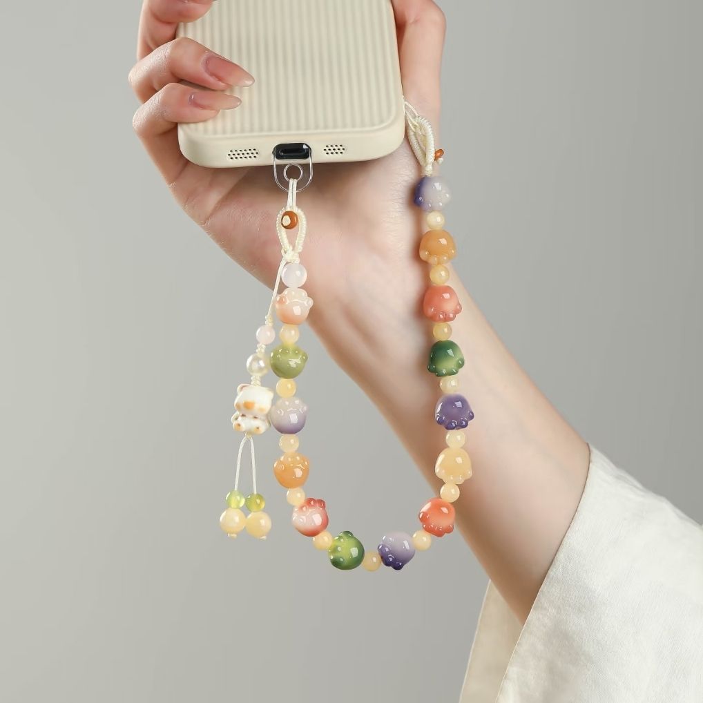 超好看独特手机链新品渐变可爱猫爪菩提可盘高端串珠挂件腕款壳女