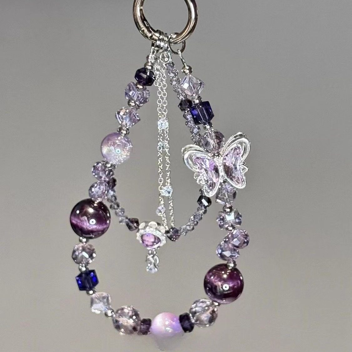 新款超好看轻奢小众精致高级感手机链紫色蝴蝶水晶串珠手机链女士