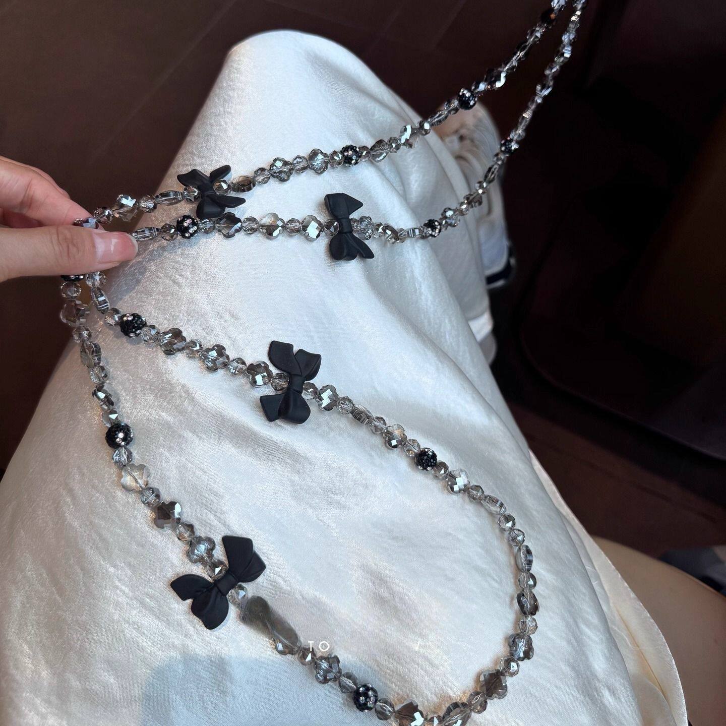 韩系手机挂绳黑色蝴蝶结手机链斜挎可背带手机挂女黑灰串珠链条