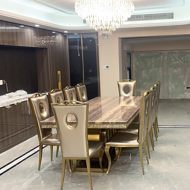 餐桌轻奢现代高端大理石家用客厅不锈钢大师设计简约长方形饭桌椅