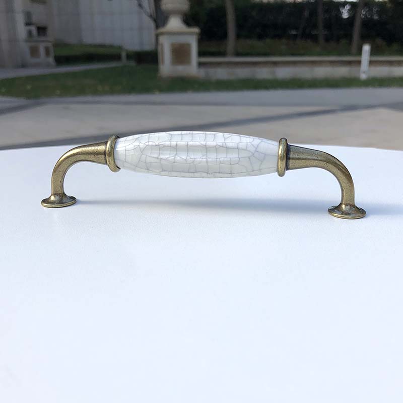 128陶瓷拉手裂纹橱门柜抽屉把手单孔仿古铜N明装柜门锌合金大理石